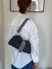 2026 Nova Fivela de Cinto de Moda Vintage para Uso Diário na Cidade Bolsa de Mão Bolsa de Ombro para Braço para Mulheres Estilo Coreano Produto Único Tendência