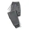 Novos Calças Casuais Largas Aconchegantes com Forro de Lã para Outono/Inverno 2024 Calças de Moletom Tamanho Grande para Homens com Zíper para o Trabalho