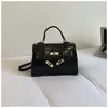 Bolsas de Mujer Transfronterizas 2026 Nuevo Bolso Kelly Moda Versátil Bolso Cruzado de Gama Alta Retro Nicho Bolso de Mano Bolso de Hombro