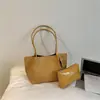 Bolsa de mano tejida de gran capacidad transfronteriza, moderna, casual, versátil, adecuada para ir al trabajo, bolso de hombro de moda de nicho, bolso de axila elegante