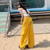 Pantalones de hoz de herramientas Primavera y Verano Americano 2025 Jeans cimitarra bordados para mujer Retro Amarillo Sentido del diseño Sueltos