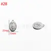 Venta al por mayor del fabricante Acero Inoxidable Presión de Aceite Colgante Cabeza Humana DIY Estilo Europeo y Americano Colgante Personalizado Accesorios de Joyería DIY