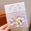 Novos elásticos de cabelo pequenos em formato de coração para crianças, doces e versáteis, perfeitos para rabos de cavalo de bebês, elásticos de cabelo e acessórios de cabelo