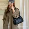 Bolso de mano de nicho estilo coreano para mujer, nueva colección otoño 2026, bolso tote con patrón de diamantes, bolso de hombro de moda para el trabajo, y bolso de axila