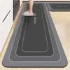 Alfombrilla de suelo de tierra de diatomeas estilo nórdico minimalista transfronteriza, resistente a la suciedad y fácil de limpiar, alfombrilla de cocina, juego de dos piezas de tira larga, alfombrilla para pies de cocina