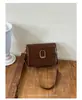 Bolsa Quadrada Pequena Retrô Transfronteiriça Feminina 2026 Nova Simples Temperamento Bolsa de Axila Deslocamento Diário Bolsa de Ombro Único Transversal Tendência
