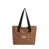 2025 Nova Bolsa de Mão Fashionable para Estudante Universitário Bolsa de Ombro Simples Feminina de Alta Qualidade Nicho Casual Versátil Bolsa Tote