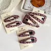 Pinza para el pelo con estampado de leopardo rosa dulce y genial estilo retro, mismo estilo que Dongdaemun Corea, clip de rotura versátil de alta gama, clip lateral para flequillo