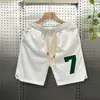 Shorts brancos simples masculinos de verão finos marca de moda listrados vestuário externo calças esportivas curtas masculinas soltas calças de praia