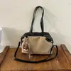 Bolsa de mano estilo coreano Ruien para mujer, nuevo modelo 2026, gran capacidad, elegante, ligera y con diseño de patchwork, adecuada para llevar debajo del brazo