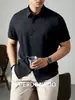 Camisa de Manga Corta Lenzing Modal con Tacto Fresco para Hombre, Verano 2026, Sin Arrugas, Anti-Arrugas, Color Sólido, Camisa de Negocios de Alta Gama Sin Costuras