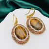 Piedra ojo de tigre perla de agua dulce cadena para suéter pulsera aretes anillo traje de cuatro piezas moda lujo otoño e invierno primera elección de las mujeres