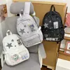 Mochila de moda con estrella de cinco puntas estilo coreano, gran capacidad, estilo ins, bolsa ligera para estudiantes con un diseño elegante, mochila de secundaria para niñas