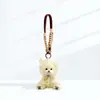 Capa de Chuva Amarela Urso de Pelúcia Pingente Bolsa Charme Chaveiro Boneco Casal Acessório Presente de Aniversário