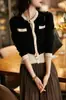 Cárdigan de punto con cuello redondo para Otoño e Invierno 2025 con combinación de colores, Elegante y cómodo, Top de punto de estilo de alta gama para mujer