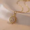Collar para Mujer Moda Nicho Nuevo Diseño Colgante Celebridad de Internet Flor de Zircón Bauhinia Giratoria Temperamento Collar de Acero Titanio