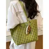 2026 Nova Bolsa Tote Elegante Simples Vazada Transfronteiriça, Bolsa de Ombro Casual Versátil para Mulheres, Bolsa Feminina de Grande Capacidade