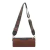 Nova Bolsa Transversal de Tecido de Nicho Outono 2025 Bolsa Feminina Casual Casual de Axila Fashionable Cilindro Pequeno de Aparência Sofisticada