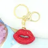 Bestseller transfronteiriço: chaveiro de lábio vermelho cravejado de diamantes, requintado e de alta qualidade, acessório de bolsa moderno para meninas, atacado