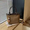 Bolso de cubo retro esmerilado de mano súper popular para mujer de principios de otoño, nuevo modelo 2026, bolso de hombro y cruzado de alta gama para el día a día y el trabajo