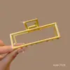 2025 Estilo Coreano Aleación Galvanizada Triángulo Geométrico Pinza de Tiburón Accesorio para el Cabello de Mujer Yiwu Fresco y Dulce Accesorio para la Cabeza