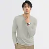 Camiseta de manga larga antibacteriana de modal grado 10A para hombre, nuevo modelo primavera y otoño 2026, top de camiseta base blanca con cuello redondo