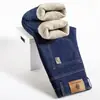 Jeans gruesos con forro de polar para hombre, pantalones rectos holgados, nuevos 2023, algodón elástico para mediana edad, otoño e invierno, cálidos, transfronterizos