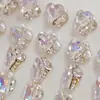 Video de Uñas Artísticas Color Moonlight Ultra Brillante de Moda Producto Terminado con Diamantes Apilados de Cristal y Perlas Decoración Popular de Diamantes Irregulares en Forma de Corazón, Rectangulares y de Ángulo Recto
