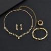 Accesorios de novia sencillos de moda transfronteriza 2024: collar, pendientes, pulsera y anillo de diamantes de imitación dorados.
