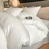 Juego de cuatro piezas de jacquard de algodón de fibra larga de lujo ligero de alta gama, sábana de algodón puro, funda de edredón, sábana bajera, ropa de cama para hotel y casa de huéspedes