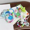 Nuevo Llavero Colgante de Conejo Acrílico Tridimensional Galvanizado Accesorios Pequeños Frescos de Colores con Cuentas Decoración para Cubierta de Auriculares