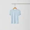 Camiseta de Lino Tencel Ajustada para Mujer 2026 Primavera/Verano Nueva Cuello Redondo Hombro Normal Color Sólido Versátil Botón de Concha Manga Corta