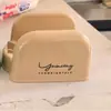 Estante de almacenamiento para tapas de ollas de estilo crema, estante para espátula, estante de almacenamiento integrado para estufa de cocina, escurridor de utensilios, palillos y cucharas.