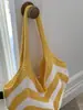Bolso tejido de color block a rayas estilo ins coreano para mujer, nuevo estilo 2026, bolso tote casual de ganchillo, bolso de punto de un solo hombro