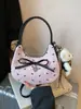 Bolso de Verano Transfronterizo con Lazo Rosa Bajo el Brazo Modelo Nuevo 2026 Bolso Cruzado Estilo Ballet de Gama Alta Bolso Baguette de Moda