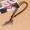 Collar de Cuero Alas de Ángel AliExpress Collar Popular Europeo y Americano de Cuero Vacuno Caliente Lote Directo de Fábrica