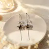 Pendientes Únicos de Diseñador con Estampado de Leopardo y Borla de Estrella de Cinco Puntas para Mujer, Estilo Largo Nuevo, Pendientes de Alta Gama Elegantes y de Moda