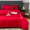 Boda Juego de cuatro piezas Boda Ropa de cama de boda Funda de edredón bordada Rojo Ceremonia de boda Habitación de bodas Cama de bodas Kit festivo de estilo chino