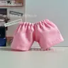 Pantalones cortos de 15 cm con un diseño simple de color liso, cintura elástica, pantalones versátiles, con los diseños del personaje "Gazi Jie" y "Perro Zhangmen"
