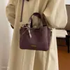 Bolso cubo, versátil y elegante, con una lujosa textura de gamuza, un bolso cruzado de moda, un nuevo bolso de hombro de nicho y moderno para mujer, 2026