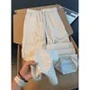 Pantalones casuales jacquard de espina de rosa retro americano para hombre, pantalones de otoño de corte limpio, pantalones de pierna ancha rectos holgados y fluidos