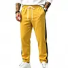 Pantalones deportivos jogger casuales para hombre, de pierna recta, holgados, de color liso y bloques de color, para otoño e invierno, transfronterizos, europeos y americanos, 2026, venta al por mayor