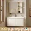 Tocador de baño engrosado y ahorrador de espacio con diseño en color crema, que cuenta con un lavabo redondeado, lavabo cerámico integrado y un lavabo de una sola pieza.