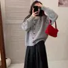 Cárdigan suéter retro de estilo coreano suave y acogedor con cuello redondo para mujer, nuevo diseño de otoño e invierno con un ambiente casual