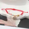 Pulsera de Cuerda Roja con Amuletos de Trébol, Mariposa y Cristales, Pulsera Tejida Ajustable para Parejas y Estudiantes, Joyería de Año de Nacimiento