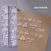 Caja de Decoraciones para Uñas Flor de Cinco Pétalos Diamantes de Imitación Planos Mixtos Remaches de Resina Aurora Lazo Flor de Camelia Diamantes de Imitación Decorativos