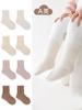 Calcetines para bebé 0-6 meses Primavera y Otoño Media pantorrilla calcetines para bebé clase A algodón peinado color sólido calcetines para niños no aprietan las piernas