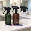 Diseño clásico de botella redonda Boston, botella de spray recargable portátil multicolor, materiales de embalaje para botella de spray recargable de gran capacidad