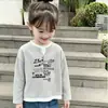 Camiseta elegante de manga larga para niña, nuevo modelo de primavera y otoño, con textura de gofre, efecto de dos piezas, top básico versátil y moderno para niños mayores