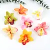 6cm Cabeça de Orquídea Cymbidium Artificial Acessórios de Toque Grampo Lembrança de Casamento Layout de Fundo DIY Arranjo de Flores Fabricante Atacado